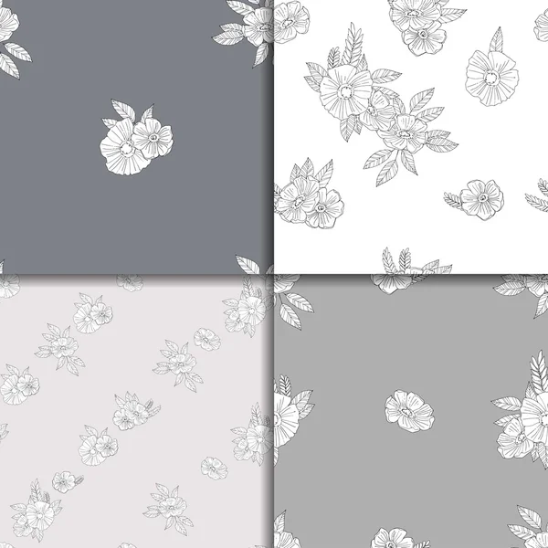 Conjunto de cuatro motivos florales en blanco y negro — Archivo Imágenes Vectoriales