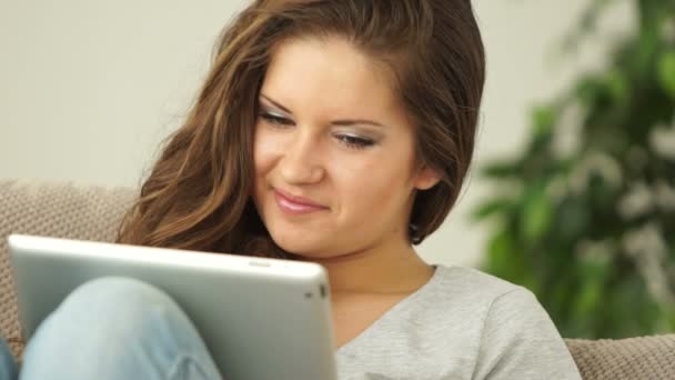 Woman with touchpad looking at window — Stock Video