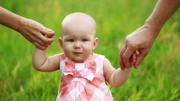 Baby girl learning to walk. — Stock Video