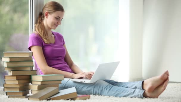 Cheerful girl  using laptop — Stock Video