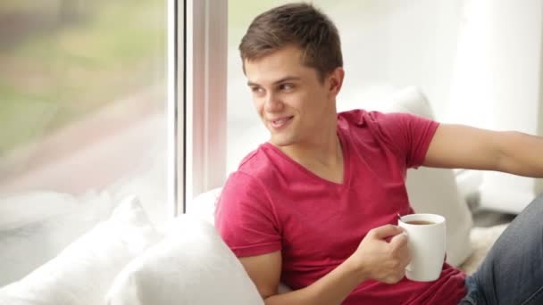 Man drinking tea from cup — Stock Video