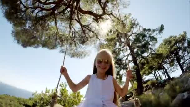 Happy girl on swing — Stock Video