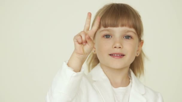 Little girl showing peace — Stock Video