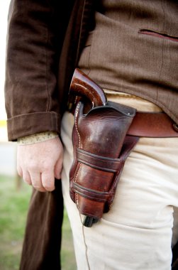 Gun close up in old west holster clipart