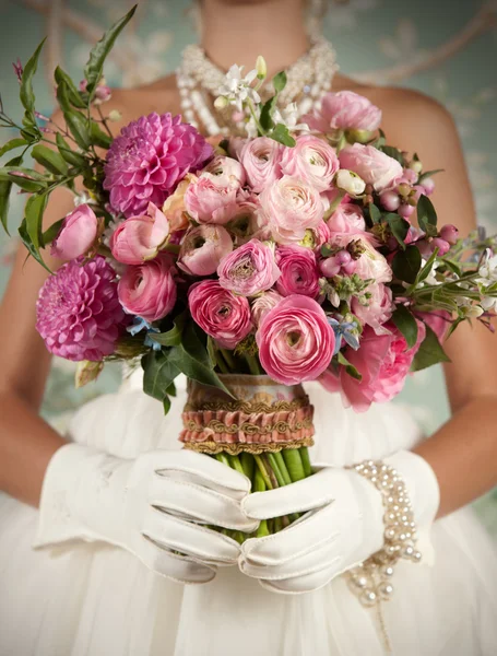 Stylized Bride holding beautiful Bouquet — Stock Photo, Image