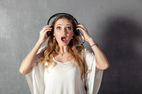 Woman in call center with phone headset — Stock Photo, Image