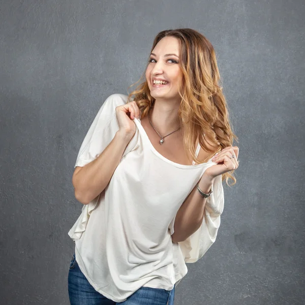 Casual young girl acting up at party — Stock Photo, Image