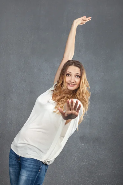 Casual young girl acting up at party — Stock Photo, Image