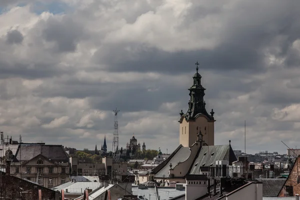 High tower among old roofs, Lviv — Stock Photo, Image