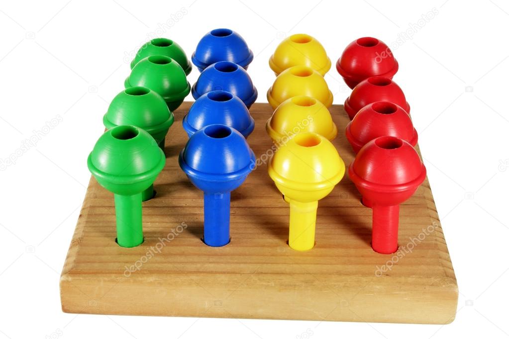 Game Pegs on Wooden Board