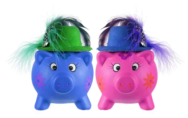 Piggy banken met feest hoeden — Stockfoto