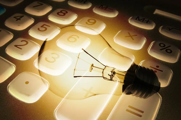 Calculator and Light Bulb — Stock Photo, Image