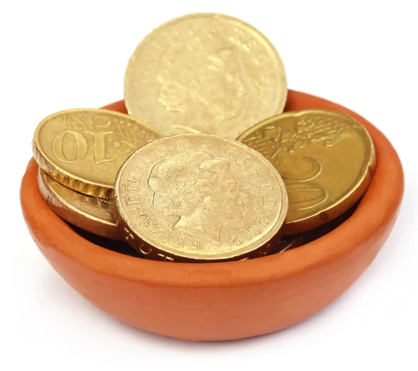 Coins in a pottary — Stock Photo, Image