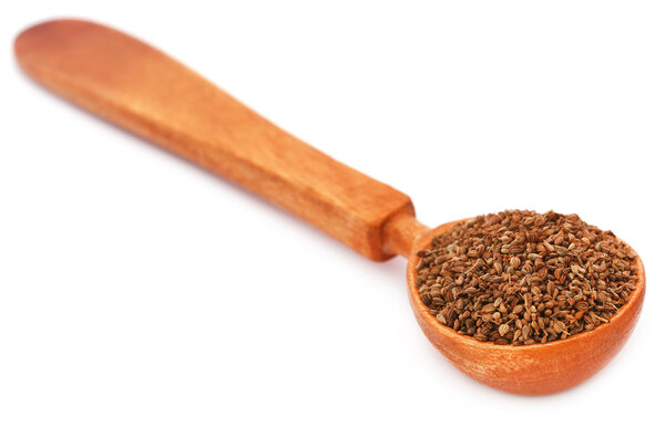 Ajwain seeds in a wooden spoon