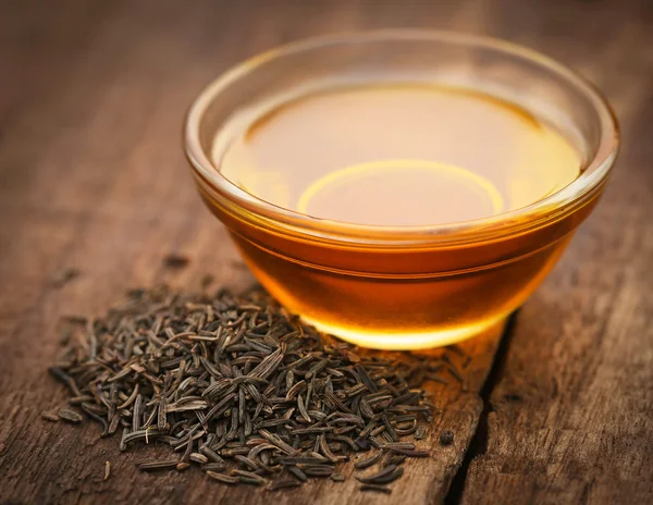 Caraway seeds with essential oil — Stock Photo, Image