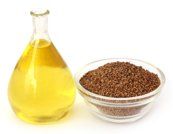 Ajwain seeds in a glass bowl with essential oil