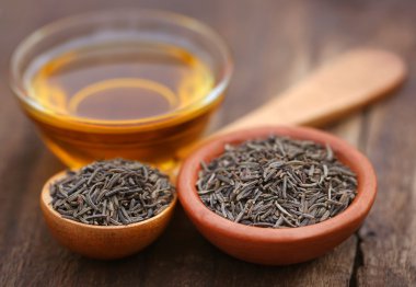 Caraway seeds with essential oil clipart