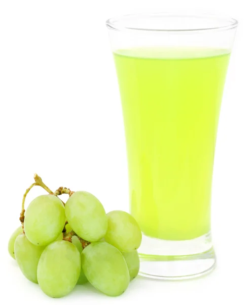 Grape juice in a glass with fresh fruits — Stock Photo, Image