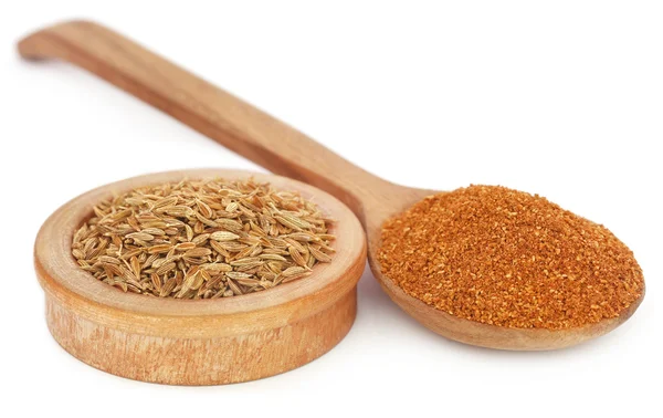 Crushed cumin with whole ones — Stock Photo, Image