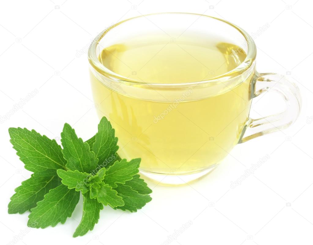 Herbal tea in a cup with stevia leaves — Stock Photo © bdspn74 116027012