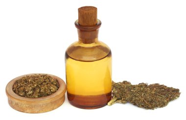 Şişesinde özüt yağ bulunan tıbbi esrar.