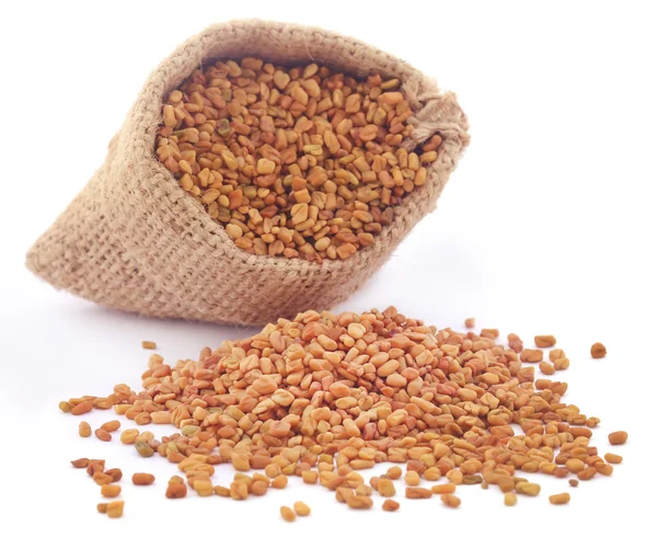 Fenugreek seeds in sack — Stock Photo, Image