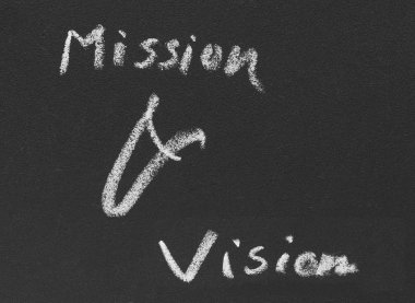 Mission and vision written in blackboard clipart