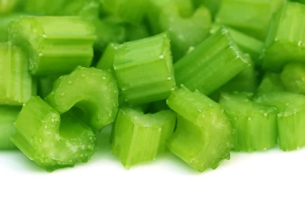 Zelený celer přes bílý — Stock fotografie