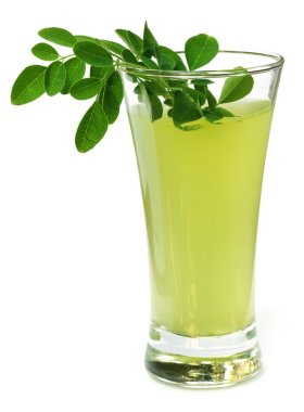 Ayurvedic Juice made from moringa leaves clipart
