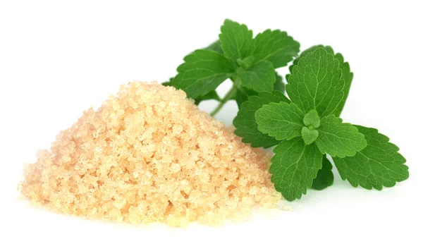 Azúcar morena con hojas de stevia — Foto de Stock