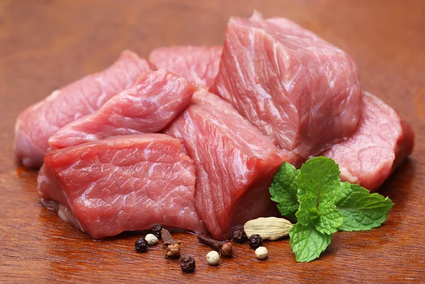 Raw beef with spices — Stock Photo, Image