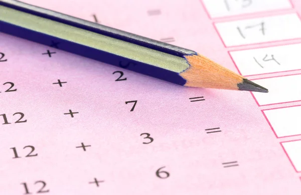 Preliminary mathematics with a pencil — Stock Photo, Image