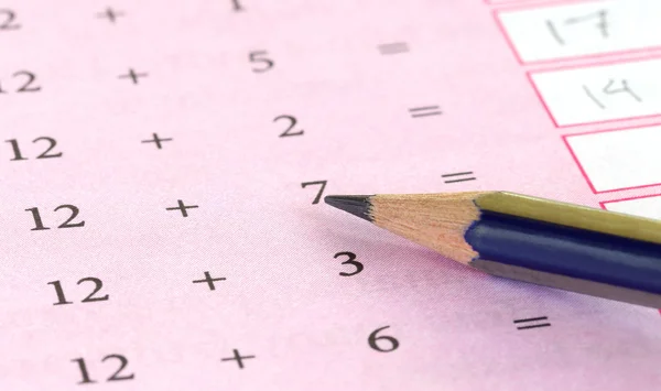 Preliminary mathematics with a pencil — Stock Photo, Image