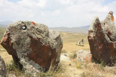 Zorats Karer or Carahunge is a prehistoric archaeological site near the town of Sisian. Armenia