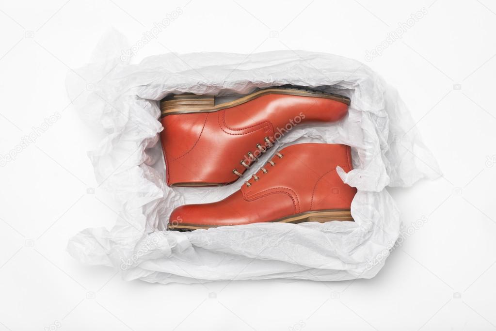 New red shoes in box