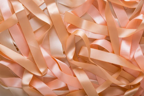 Beige satin ribbon background — Stock Photo, Image
