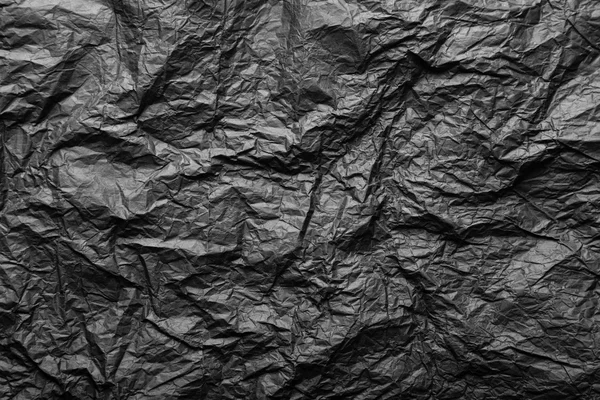 Black crumpled paper texture Stock Photo