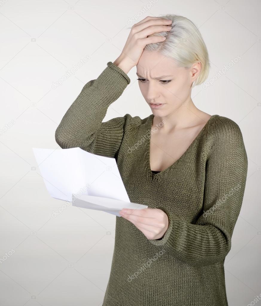 woman reading letter