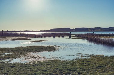 Güneş Middelhagen 'deki suya yansıdı