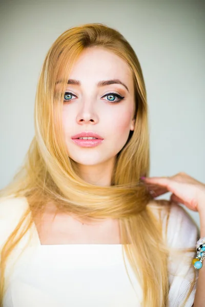 Beautiful blonde woman with long hair — Stock Photo, Image