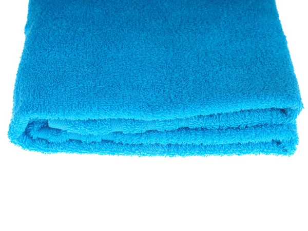 Голубое полотенце на белом фоне — стоковое фото