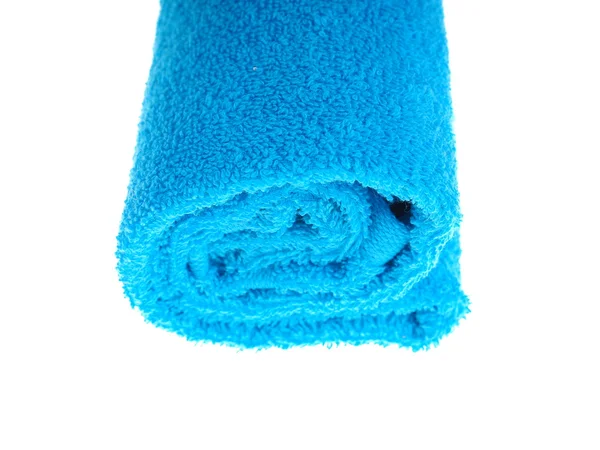 Blaues Handtuch auf weißem Hintergrund — Stockfoto