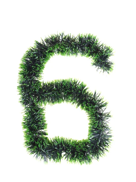 Numeral de decoraciones verdes del árbol de Navidad sobre un fondo blanco — Foto de Stock