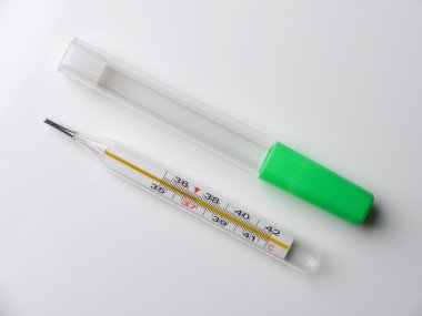 gri bir arka plan üzerinde termometre