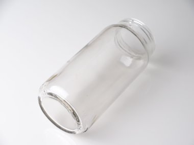 gri bir arka plan üzerinde cam kavanoz