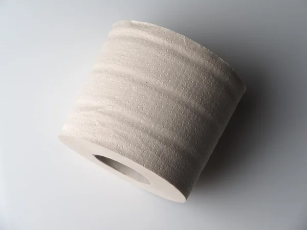 Toilet paper on a light background — Stock Photo, Image