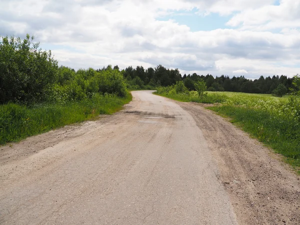 Onverharde weg in het dorp — Stockfoto