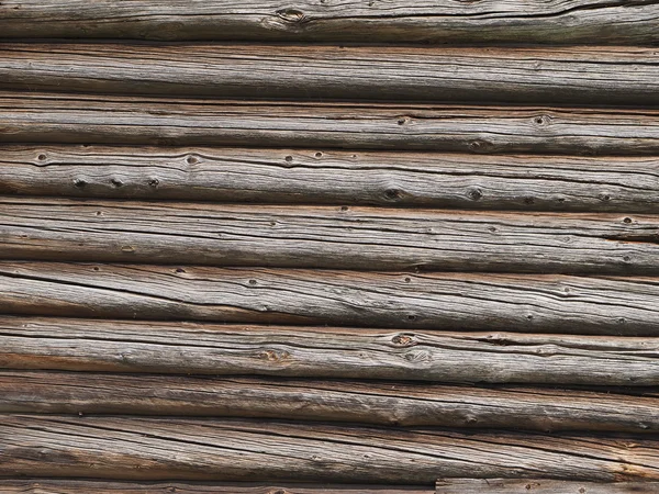 Old log cabin wood wall. background