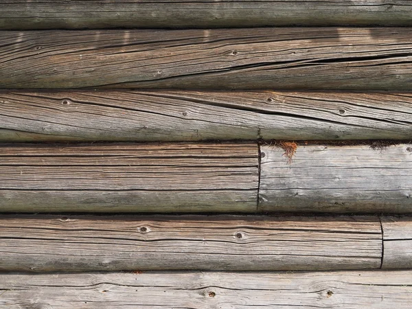 Old log cabin wood wall. background