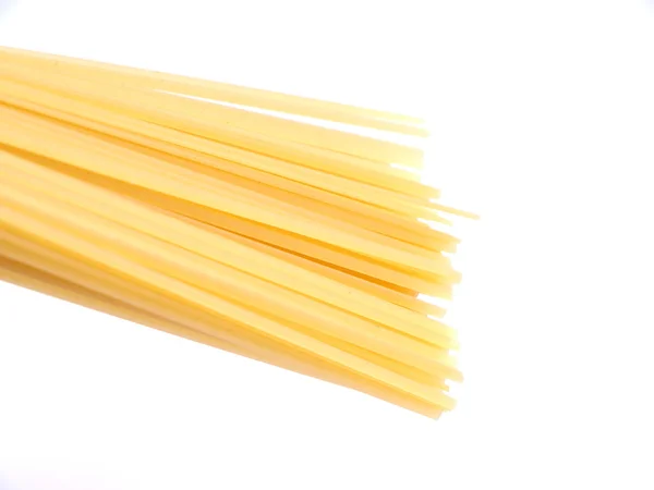 Spaghetti på en vit bakgrund — Stockfoto